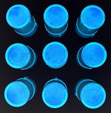 Abstract background overhead view of lights illuminated in the dark shining bright blue