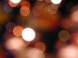 Out of focus lights for abstract background with festive or busy nightlife with copy space
