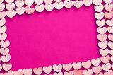 Pink heart background for Valentines Day, Mothers Day, a wedding or anniversary with central copy space for a message to a sweetheart or loved one