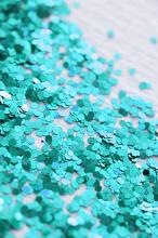 macro image of cyan coloured glitter