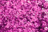 a background of pink of fucsia coloured glitter