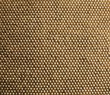 Extreme close up on golden pattern in cloth or metal as full frame background with copy space