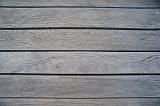 well worn and sun damaged decking boards