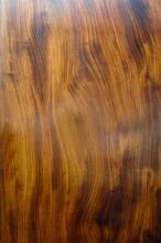 highly polished natural wood surface