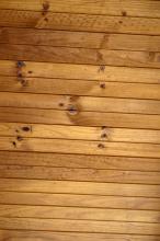 background of stained douglas fir tongue and groove planks