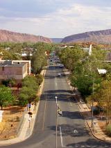 Typical street in a small Australian town nestled amongst trees in a high angle scenic landscape view