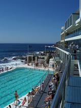 View of the icebergs swimming pool at Bondi Beach near Sydney, New South Wales, Australia on a sunny summer day with people and tourists enjoying the sunshine