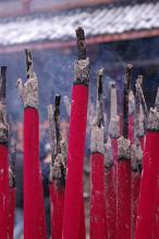 stick on red burning incense a a chinese temple