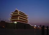The Forbidden City lights up while overlooking Beijing at night