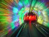 Abstract of Subway Tunnel with Colorful Streaming Psychedelic Lights as seen from Inside Tunnel