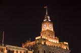 Detail of Customs House Illuminated at Night in The Bund Area of Shanghai, China