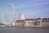 London Eye ferris wheel on the bank of the River Thames in London with its ovoid passenger gondolas from which to observe the city