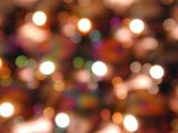 Festive background of sparkling defocused party lights in a colorful bokeh, full frame for Christmas, a special occasion or New Year
