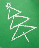 Illustration of Simple Hand Drawn Christmas Tree Topped with Star Drawn in Chalk on Green Board