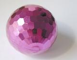 Single Fuschia Colored Ornamental Disco Christmas Ball Shining on White Background with Copy Space