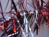 Extreme close up view of festive red and silver tinsel