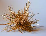 Close Up of Messy Ball of Gold Tinsel in Studio, Festive Piece of Isolated Gold Tinsel Christmas Decoation