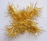 Sparkling festive metallic gold Christmas tinsel decoration on a white background