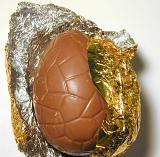an opened chocolate egg with eaten chocolate