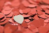 a background of red heart shaped confetti makes a great valentine backdrop
