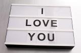 Tender I Love You Valentines Day message on a small light box over a graduated grey to white background