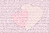 the words love you spelt out many times over creating a pair of heart symbols out of printed letters