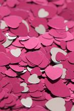 an assortment of pink heart shaped confetti creates an attractive valentine background image