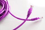 Bright pink ethernet cable conceptual of social network dating with crossed plugs symbolising a relationship online