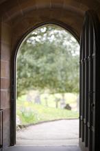 looking out through an old church door
