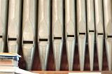 a set of organ pipes from a small church organ