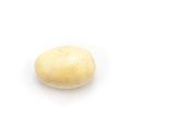Single whole cleaned uncooked farm fresh potato on a white background with plenty of copyspace