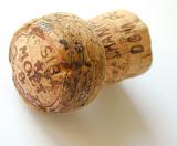 champagne cork produced by the Moet and Chandon winery in France, close up detail showing the text and labeling