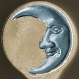 Decorative smiling moon metal plaque with a silver Man in the Moon on a beige disk over black in a square format