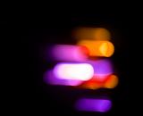 a background of motion blurred bokeh lights
