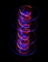 spiral of colourful red and blue line creating a three dimensional effect