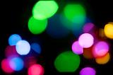 colourful distant light pictured out of focus to create a range of bokeh effects
