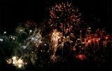 a colourful background of blue white and red firework displays