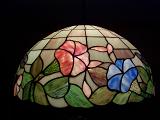 light shining through opaque glass in a tiffany style lamp shade