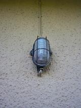 bulkhead lamp mounted on a render wall