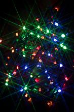 a sparkling starburst background of twinkly christmas lights