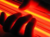 fingers grasping a pair of glowing neon tube lights