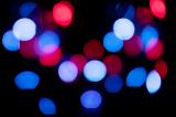a pretty bokeh background of red and blue overlapping points of light