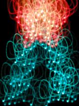 an abstracted christmas treeshape with lightpainted motion effect