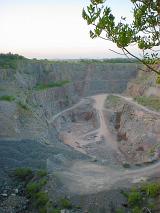 High angle view of pathways and ridges of mined quarry in daylight
