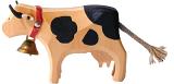 a carved wooden cow traditional toy or ornament