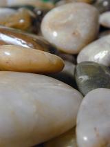 an assortment of rounded river washed stones