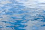 Calming crisp deep blue waves of water