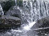 water bubbling over a small cascade in the north wales hills