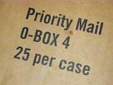 Brown cardboard packaging box for Priority mail with associated text viewed close up