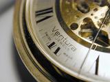 close up image of the dial of an antique pocket watch